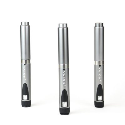 Three silver VAION pens are standing upright against a white background. Each pen has a sleek design with a black cap at the base and the brand name "VAION" printed vertically on the body.